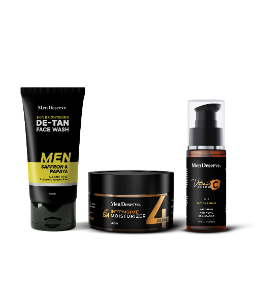 A set of men's skincare products including a de-tan facewash, moisturizer, and vitamin C serum