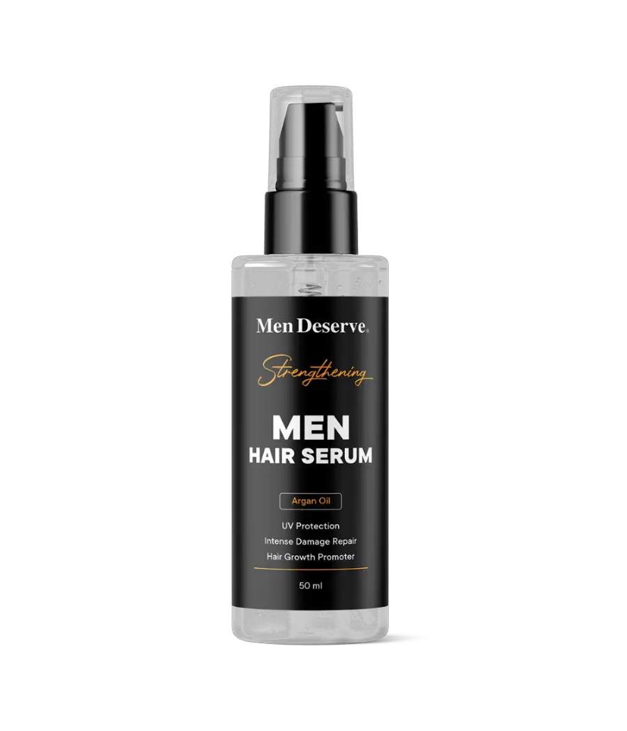 A bottle of Men Hair Serum with a label that reads 'Men Deserve Strengthening'. The bottle is transparent with a white spray nozzle and the liquid inside appears to be clear.