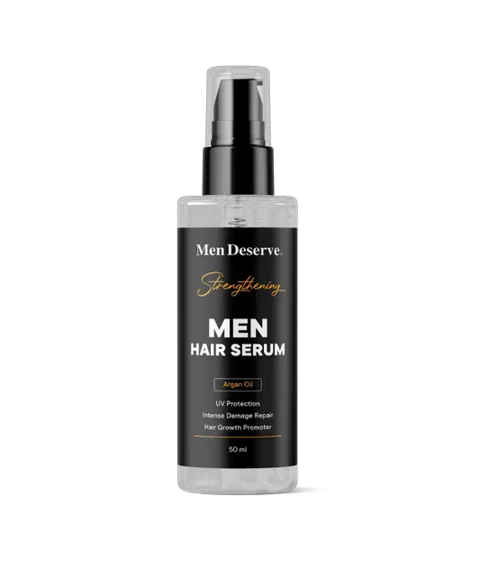 A bottle of Men Hair Serum with a label that reads 'Men Deserve Strengthening'. The bottle is transparent with a white spray nozzle and the liquid inside appears to be clear.