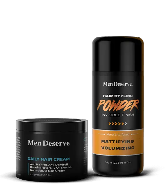 Two hair styling products, one in a blue container labeled 'Men Deserve Daily Hair Cream' and one in a black bottle with orange labeling 'Men Deserve Hair Styling Powder Invisible Finish'.