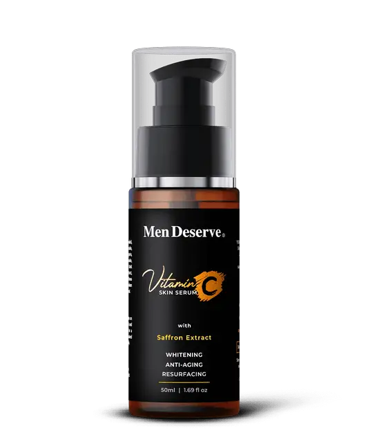 A bottle of Men Deserve Vitamin C Skin Serum with a pump dispenser, labeled for skin brightening and anti-aging.